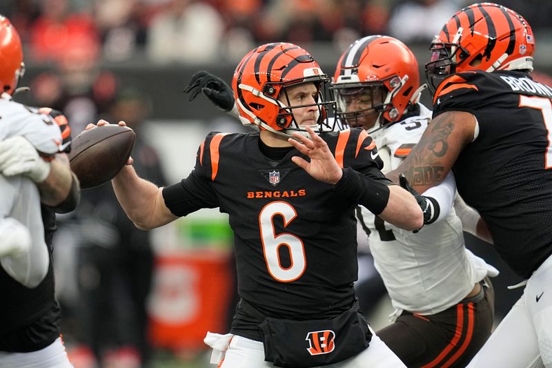 Cincinnati Bengals quarterback Jake Browning (6) passes in the second half of an NFL football game against the Cleveland Browns, Sunday, Jan. 7, 2024, in Cincinnati. (AP Photo/Sue Ogrocki)