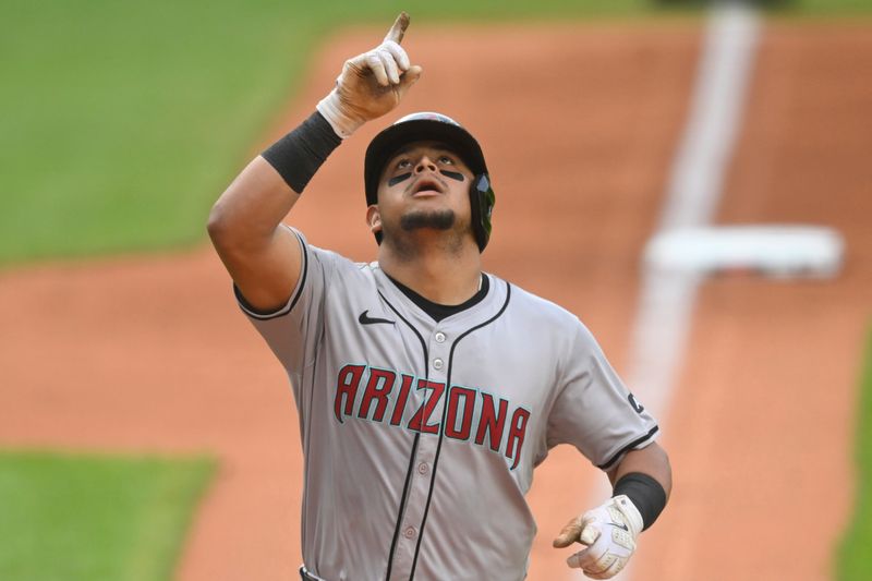 Aug 5, 2024; Cleveland, Ohio, USA; Arizona Diamondbacks catcher Gabriel Moreno (14) celebrates his solo home run in the first inning against the Cleveland Guardians at Progressive Field. Mandatory Credit: David Richard-USA TODAY Sports