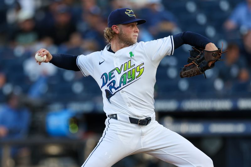 May 24, 2025; Tampa, Florida, USA; Tampa Bay Rays starting pitcher Shane Baz (11) throws a pitch against the Toronto Blue Jays in the first inning at George M. Steinbrenner Field. Mandatory Credit: Nathan Ray Seebeck-Imagn Images