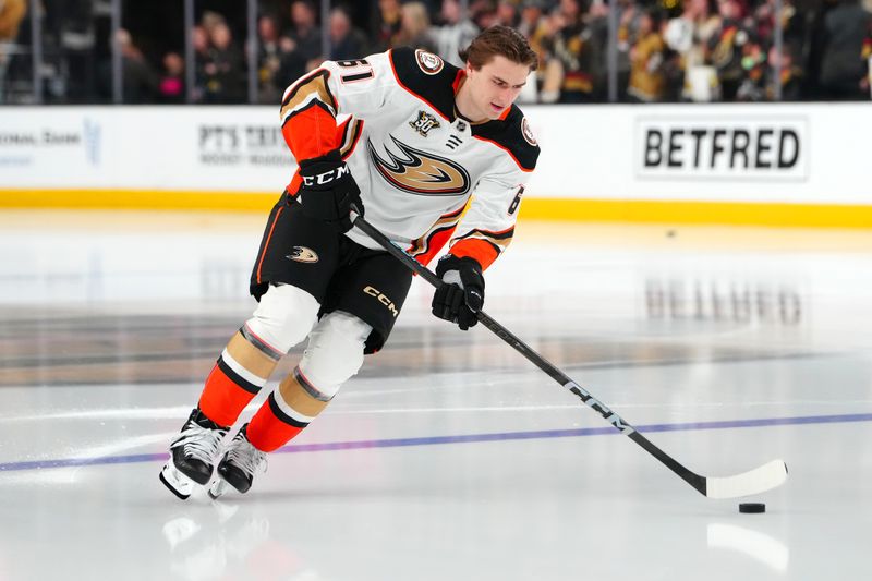 Apr 18, 2024; Las Vegas, Nevada, USA; Anaheim Ducks left wing Cutter Gauthier (61) takes a rookie lap before the start of a game against the Vegas Golden Knights at T-Mobile Arena. Mandatory Credit: Stephen R. Sylvanie-USA TODAY Sports