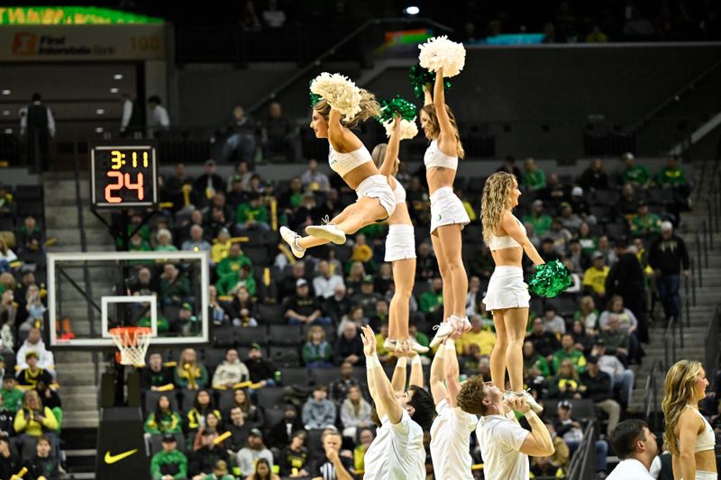 Dec 2, 2025; Eugene, Oregon, USA; Oregon Ducks cheerleaders perform during the first half against the Southern California Trojans at Matthew Knight Arena. Mandatory Credit: Craig Strobeck-Imagn Images