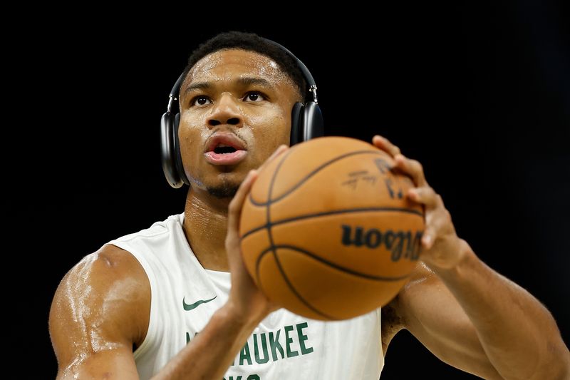 MILWAUKEE, WISCONSIN - OCTOBER 20: Giannis Antetokounmpo #34 of the Milwaukee Bucks warms up before the preseason game against the Memphis Grizzlies at Fiserv Forum on October 20, 2023 in Milwaukee, Wisconsin. NOTE TO USER: User expressly acknowledges and agrees that, by downloading and or using this photograph, User is consenting to the terms and conditions of the Getty Images License Agreement. (Photo by John Fisher/Getty Images)