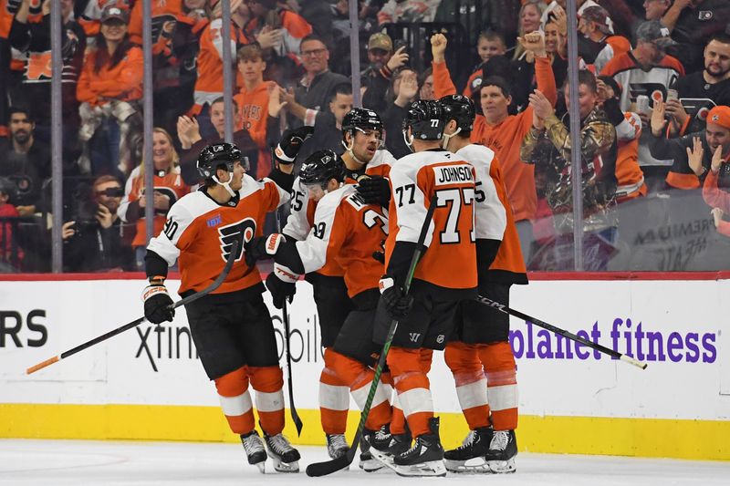 Nov 11, 2024; Philadelphia, Pennsylvania, USA; Philadelphia Flyers right wing Matvei Michkov (39) celebrates his goal with teammates against the San Jose Sharks during the second period at Wells Fargo Center. Mandatory Credit: Eric Hartline-Imagn Images