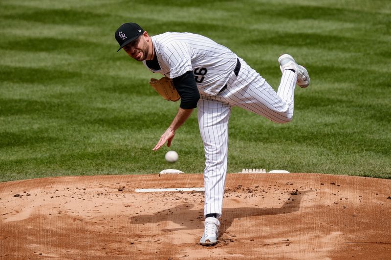 Apr 10, 2024; Denver, Colorado, USA; Colorado Rockies starting pitcher Austin Gomber (26) pitches in the first inning against the Arizona Diamondbacks at Coors Field. Mandatory Credit: Isaiah J. Downing-USA TODAY Sports