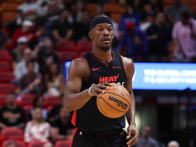 MIAMI, FLORIDA - MARCH 05: Jimmy Butler #22 of the Miami Heat dribbles the ball against the Detroit Pistons during the first quarter of the game at Kaseya Center on March 05, 2024 in Miami, Florida. NOTE TO USER: User expressly acknowledges and agrees that, by downloading and or using this photograph, User is consenting to the terms and conditions of the Getty Images License Agreement. (Photo by Megan Briggs/Getty Images)