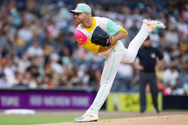 Sep 6, 2024; San Diego, California, USA; San Diego Padres starting pitcher Michael King (34) throws a pitch during the first inning against the San Francisco Giants at Petco Park. Mandatory Credit: David Frerker-Imagn Images