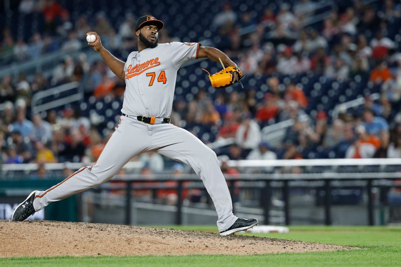 Apr 24, 2025; Washington, District of Columbia, USA; Baltimore Orioles pitcher Félix Bautista (74) pitches against the Washington Nationals during the ninth inning at Nationals Park. Mandatory Credit: Geoff Burke-Imagn Images