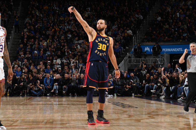 SAN FRANCISCO, CA - JANUARY 31: Stephen Curry #30 of the Golden State Warriors looks on during the game against the Phoenix Suns  on January 31, 2025 at Chase Center in San Francisco, California. NOTE TO USER: User expressly acknowledges and agrees that, by downloading and or using this photograph, user is consenting to the terms and conditions of Getty Images License Agreement. Mandatory Copyright Notice: Copyright 2025 NBAE (Photo by Noah Graham/NBAE via Getty Images)