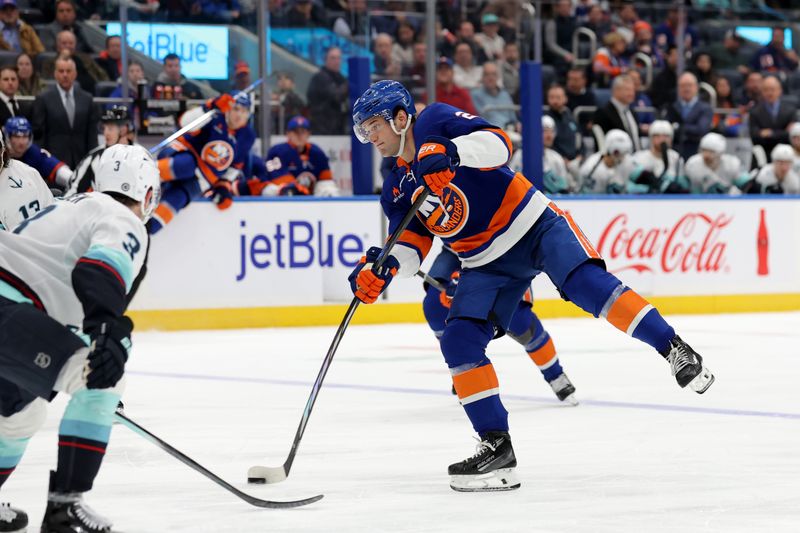 Dec 5, 2024; Elmont, New York, USA; New York Islanders right wing Oliver Wahlstrom (26) takes a shot against the Seattle Kraken during the second period at UBS Arena. Mandatory Credit: Brad Penner-Imagn Images