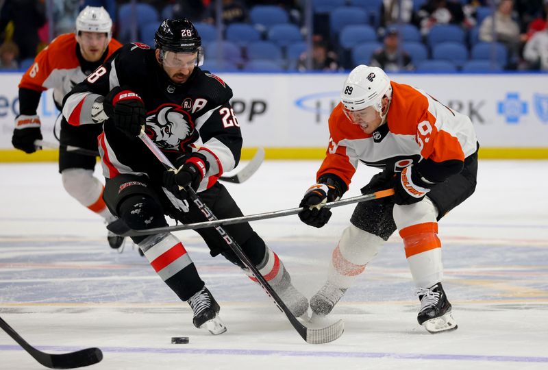 Nov 3, 2023; Buffalo, New York, USA;  Buffalo Sabres left wing Zemgus Girgensons (28) and Philadelphia Flyers right wing Cam Atkinson (89) go after a loose puck during the third period at KeyBank Center. Mandatory Credit: Timothy T. Ludwig-USA TODAY Sports