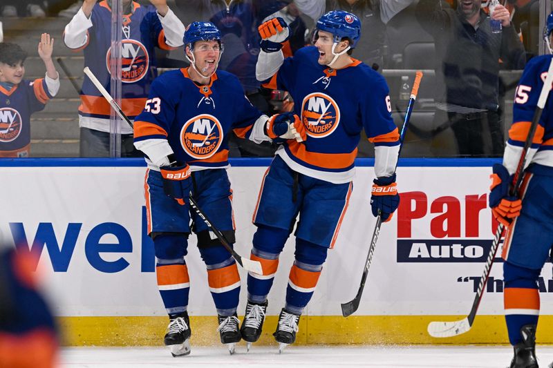 Feb 8, 2024; Elmont, New York, USA; New York Islanders defenseman Ryan Pulock (6) celebrates the goal by New York Islanders center Casey Cizikas (53) against the Tampa Bay Lightning during the second period at UBS Arena. Mandatory Credit: Dennis Schneidler-USA TODAY Sports