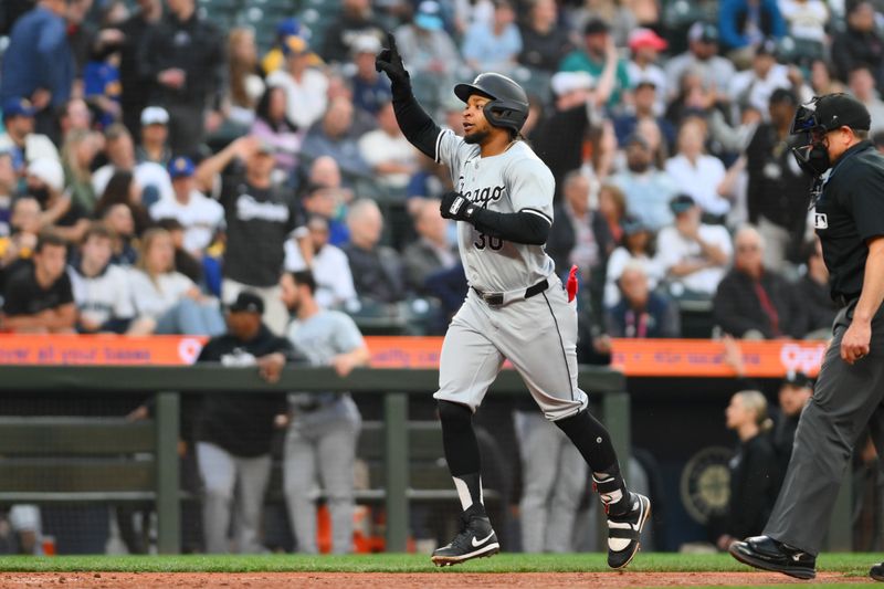 Jun 10, 2024; Seattle, Washington, USA; Chicago White Sox left fielder Corey Julks (30) celebrates after hitting a home run against the Seattle Mariners during the eighth inning at T-Mobile Park. Mandatory Credit: Steven Bisig-USA TODAY Sports