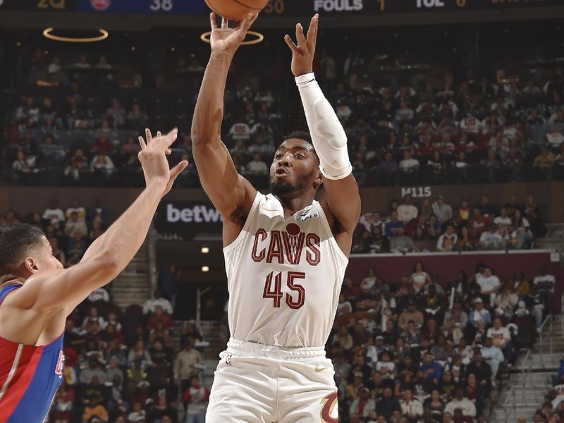 CLEVELAND, OH - OCTOBER 25: Donovan Mitchell #45 of the Cleveland Cavaliers shoots the ball during the game against the Detroit Pistons on October 25, 2024 at Rocket Mortgage FieldHouse in Cleveland, Ohio. NOTE TO USER: User expressly acknowledges and agrees that, by downloading and/or using this Photograph, user is consenting to the terms and conditions of the Getty Images License Agreement. Mandatory Copyright Notice: Copyright 2024 NBAE (Photo by David Liam Kyle/NBAE via Getty Images)