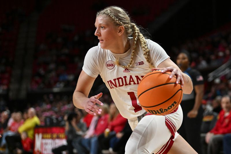 Jan 31, 2024; College Park, Maryland, USA; Indiana Hoosiers guard Lexus Bargesser (1) makes move to the basket on during the first half against the Maryland Terrapins  at Xfinity Center. Mandatory Credit: Tommy Gilligan-USA TODAY Sports