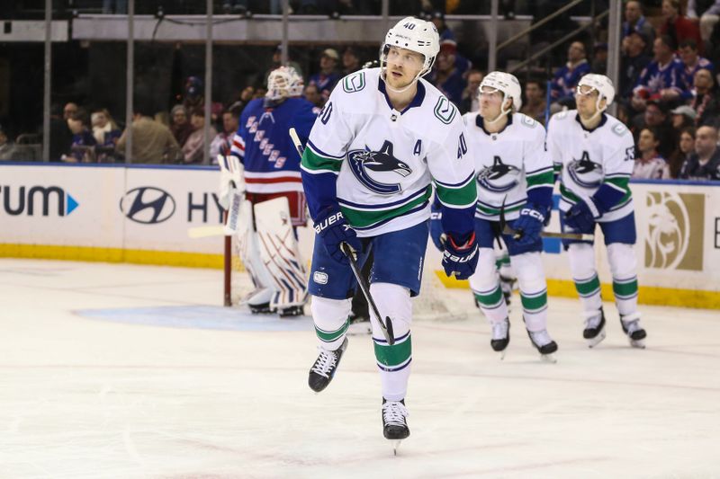 Jan 8, 2024; New York, New York, USA;  Vancouver Canucks center Elias Pettersson (40) skates to his bench after scoring a goal in the second period against the New York Rangers at Madison Square Garden. Mandatory Credit: Wendell Cruz-USA TODAY Sports