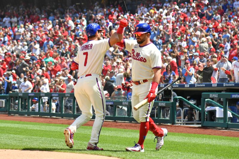 Apr 23, 2023; Philadelphia, Pennsylvania, USA; Philadelphia Phillies shortstop Trea Turner (7) celebrates his home run with left fielder Kyle Schwarber (12) against the Colorado Rockies during the first inning at Citizens Bank Park. Mandatory Credit: Eric Hartline-USA TODAY Sports