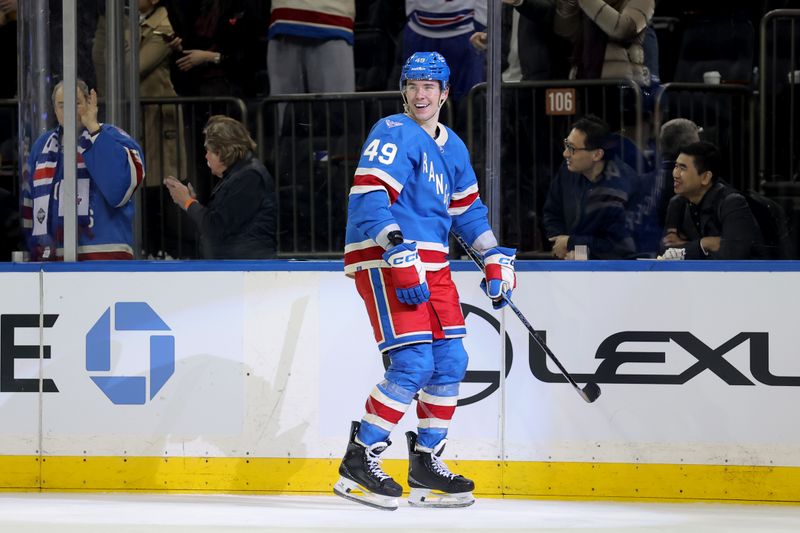 Mar 5, 2026; New York, New York, USA; New York Rangers right wing Jaroslav Chmelar (49) reacts after scoring his first NHL goal during the third period against the Toronto Maple Leafs at Madison Square Garden. Mandatory Credit: Brad Penner-Imagn Images