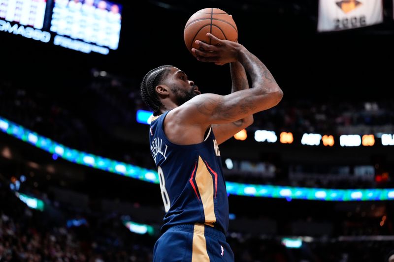 MIAMI, FLORIDA - MARCH 22: Naji Marshall #8 of the New Orleans Pelicans shoots a three-pointer against the Miami Heat during the third quarter at Kaseya Center on March 22, 2024 in Miami, Florida. NOTE TO USER: User expressly acknowledges and agrees that, by downloading and or using this photograph, User is consenting to the terms and conditions of the Getty Images License Agreement. (Photo by Rich Storry/Getty Images)