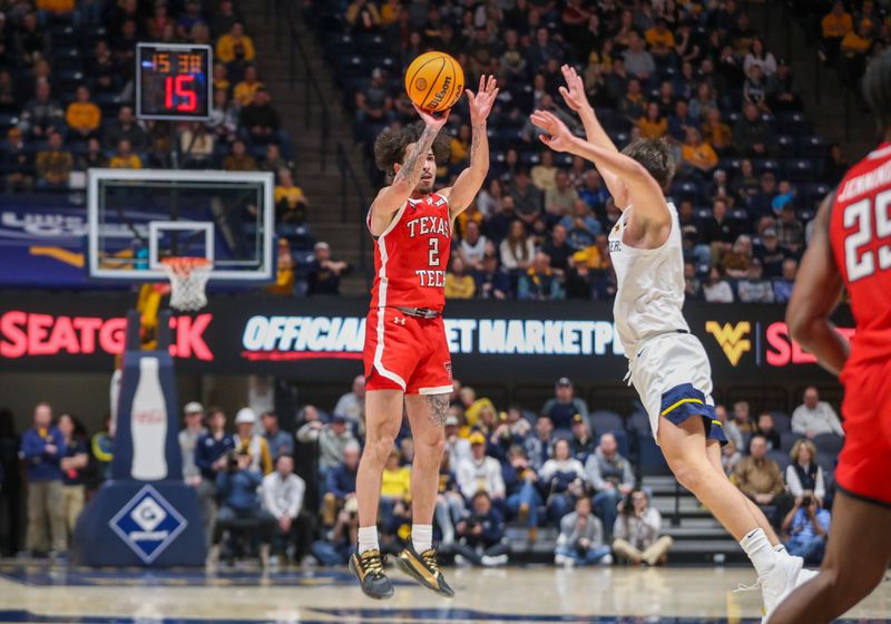 Mar 2, 2024; Morgantown, West Virginia, USA; Texas Tech Red Raiders guard Pop Isaacs (2) shoots a three pointer over West Virginia Mountaineers guard Kerr Kriisa (3) during the first half at WVU Coliseum. Mandatory Credit: Ben Queen-USA TODAY Sports