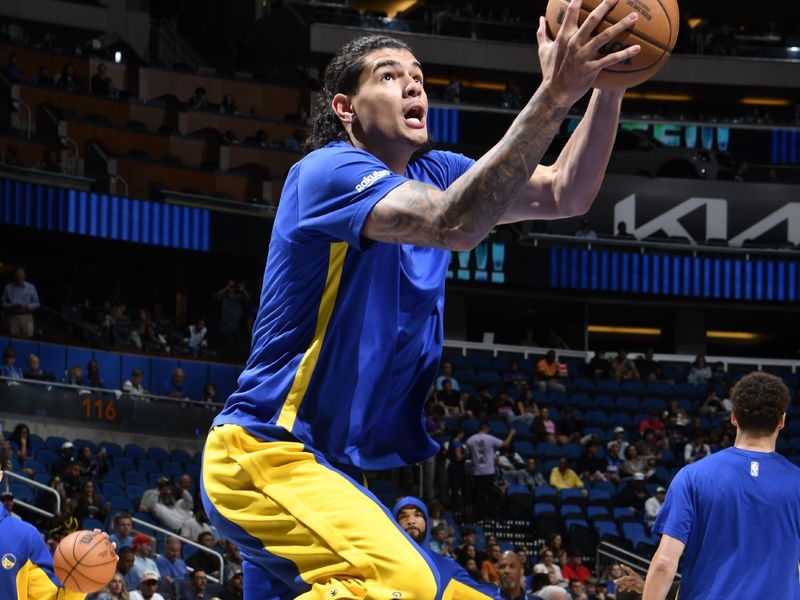 ORLANDO, FL - MARCH 27: Gui  Santos #15 of the Golden State Warriors warms up before the game against the Orlando Magic on March 27, 2024 at Amway Center in Orlando, Florida. NOTE TO USER: User expressly acknowledges and agrees that, by downloading and or using this photograph, User is consenting to the terms and conditions of the Getty Images License Agreement. Mandatory Copyright Notice: Copyright 2024 NBAE (Photo by Fernando Medina/NBAE via Getty Images)