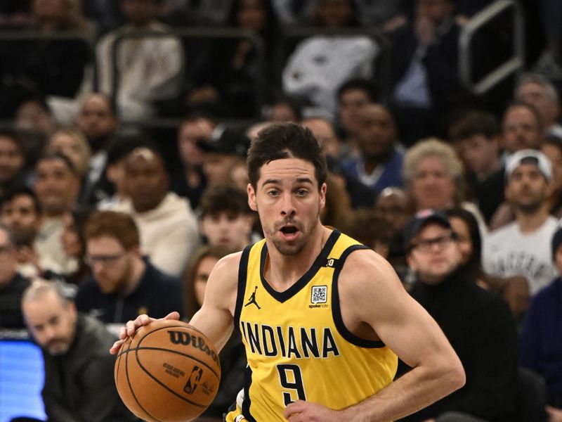 NEW YORK, NY - FEBRUARY 10: T.J. McConnell #9 of the Indiana Pacers dribbles the ball during the game against the New York Knicks on February 10, 2024 at Madison Square Garden in New York City, New York.  NOTE TO USER: User expressly acknowledges and agrees that, by downloading and or using this photograph, User is consenting to the terms and conditions of the Getty Images License Agreement. Mandatory Copyright Notice: Copyright 2024 NBAE  (Photo by David Dow/NBAE via Getty Images)