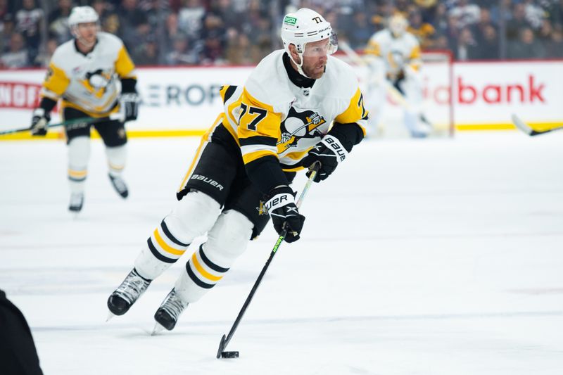 Feb 10, 2024; Winnipeg, Manitoba, CAN;  Pittsburgh Penguins forward Jeff Carter (77) looks to make a pass in the Winnipeg Jets zone during the first period at Canada Life Centre. Mandatory Credit: Terrence Lee-USA TODAY Sports