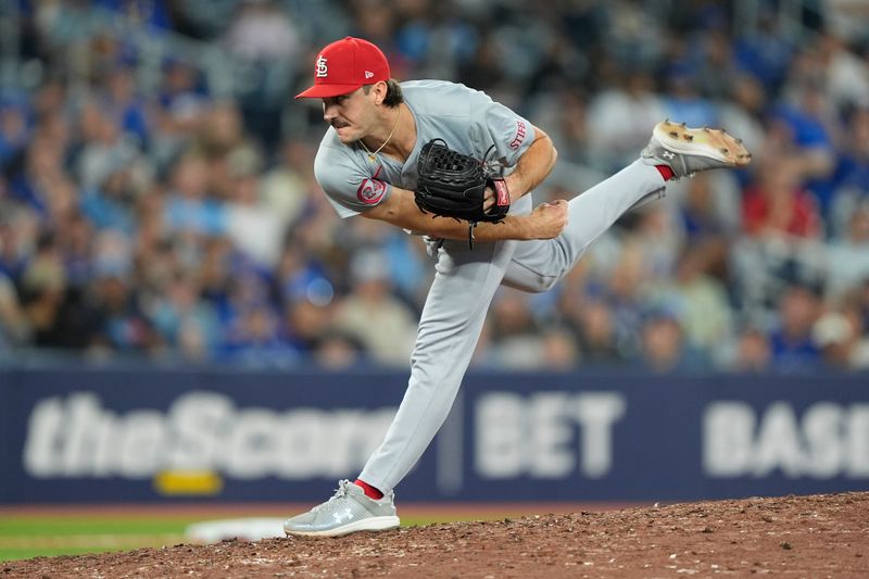 Cardinals' Early Lead Overwhelmed by Blue Jays in Extra Innings at Rogers Centre