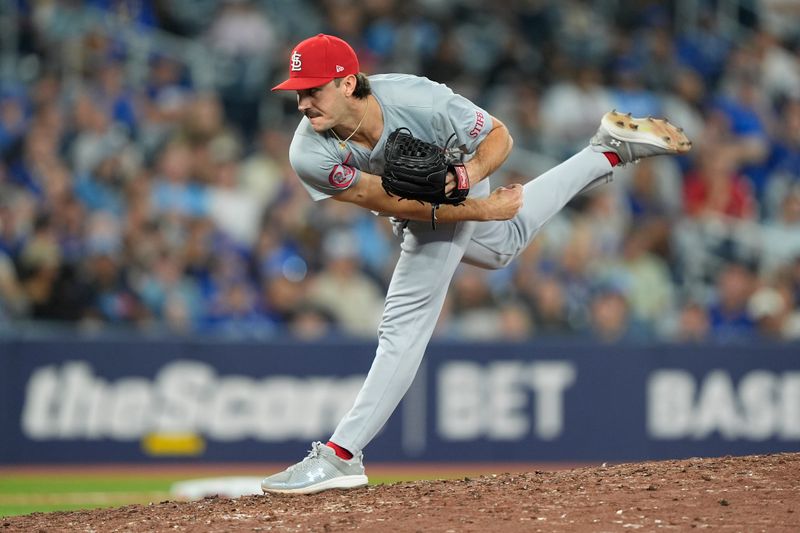 Sep 13, 2024; Toronto, Ontario, CAN; St. Louis Cardinals pitcher Ryan Fernandez (64) pitches to the Toronto Blue Jays during the tenth inning at Rogers Centre. Mandatory Credit: John E. Sokolowski-Imagn Images