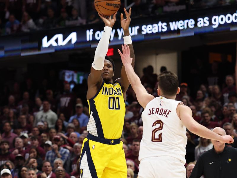 CLEVELAND, OH - MAY 4: Bennedict Mathurin #00 of the Indiana Pacers shoots a three point basket during the game against the Cleveland Cavaliers during Round 2 Game 1 of the 2025 NBA Playoffs on May 4, 2025 at Rocket Mortgage FieldHouse in Cleveland, Ohio. NOTE TO USER: User expressly acknowledges and agrees that, by downloading and/or using this Photograph, user is consenting to the terms and conditions of the Getty Images License Agreement. Mandatory Copyright Notice: Copyright 2025 NBAE (Photo by  Lauren Leigh Bacho/NBAE via Getty Images)