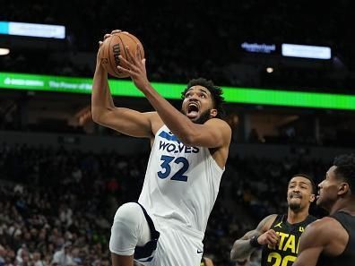 MINNEAPOLIS, MN -  NOVEMBER 30 :  Karl-Anthony Towns #32 of the Minnesota Timberwolves drives to the basket during the game against the Utah Jazz on November 30, 2023 at Target Center in Minneapolis, Minnesota. NOTE TO USER: User expressly acknowledges and agrees that, by downloading and or using this Photograph, user is consenting to the terms and conditions of the Getty Images License Agreement. Mandatory Copyright Notice: Copyright 2023 NBAE (Photo by Jordan Johnson/NBAE via Getty Images)