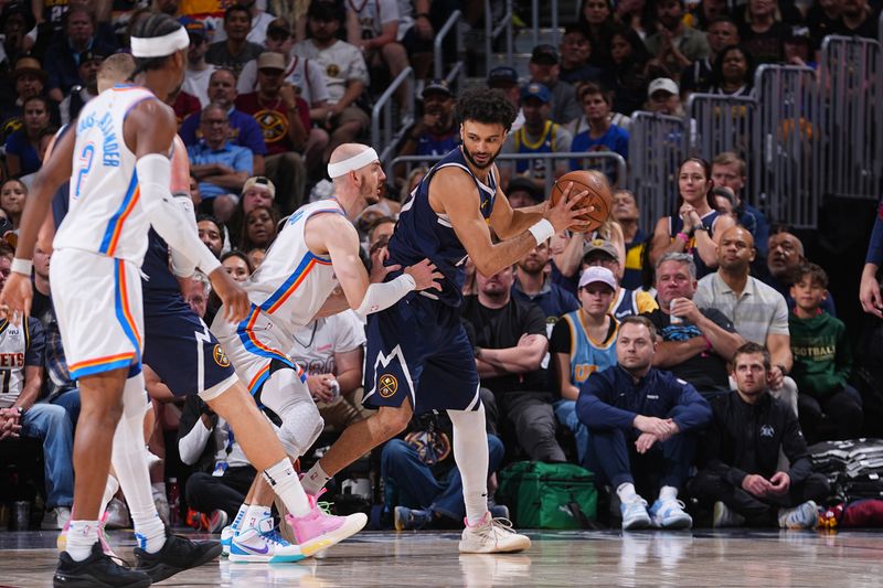 DENVER, CO - MAY 11: Jamal Murray #27 of the Denver Nuggets handles the ball during the game against the Oklahoma City Thunder during Round 2 Game 4 of the 2025 NBA Playoffs on May 11, 2025 at Ball Arena in Denver, Colorado. NOTE TO USER: User expressly acknowledges and agrees that, by downloading and/or using this Photograph, user is consenting to the terms and conditions of the Getty Images License Agreement. Mandatory Copyright Notice: Copyright 2025 NBAE (Photo by Bart Young/NBAE via Getty Images)