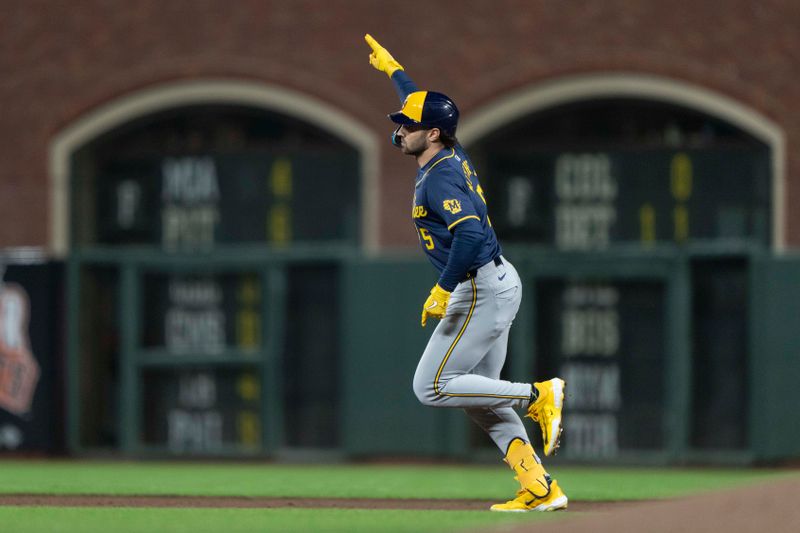 Sep 10, 2024; San Francisco, California, USA;  Milwaukee Brewers outfielder Garrett Mitchell (5) reacts after hitting a solo home run during the sixth inning against the San Francisco Giants at Oracle Park. Mandatory Credit: Stan Szeto-Imagn Images