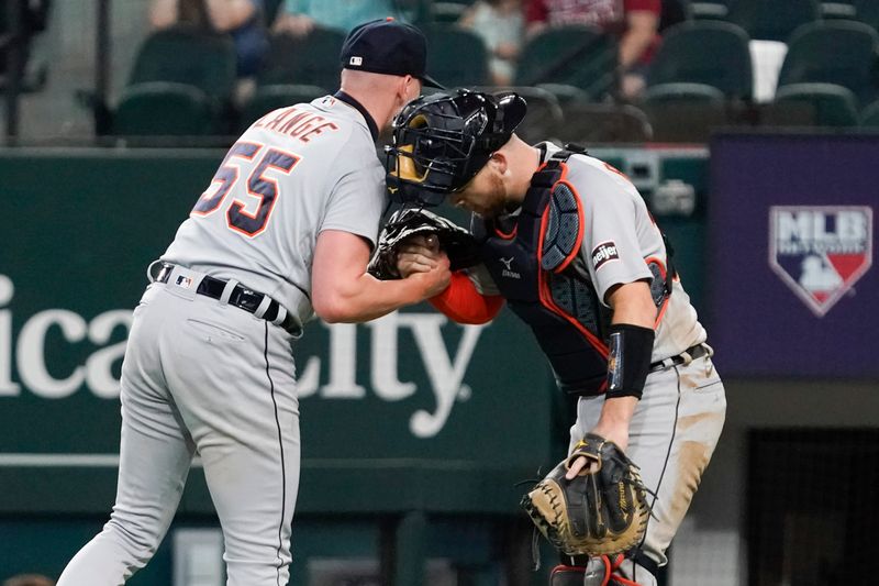 Jun 29, 2023; Arlington, Texas, USA; Detroit Tigers relief pitcher Alex Lange (55) and catcher Jake Rogers (34) react after the game against the Texas Rangers at Globe Life Field. Mandatory Credit: Raymond Carlin III-USA TODAY Sports