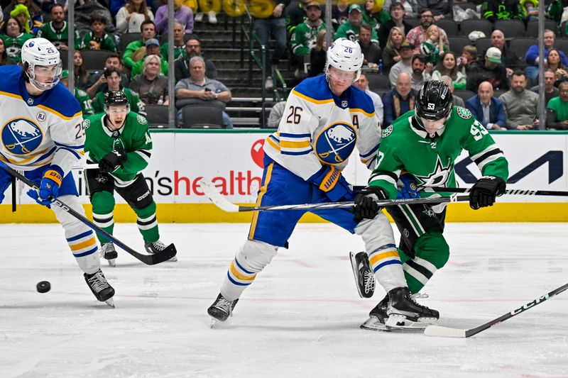 Apr 9, 2024; Dallas, Texas, USA; Dallas Stars center Wyatt Johnston (53) scores a goal on a backhand shot past Buffalo Sabres defenseman Rasmus Dahlin (26) and defenseman Owen Power (25) during the second period at the American Airlines Center. Mandatory Credit: Jerome Miron-USA TODAY Sports