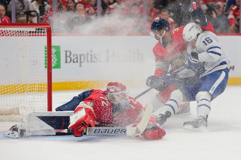 May 9, 2025; Sunrise, Florida, USA; Florida Panthers goaltender Sergei Bobrovsky (72) gets snowed by Toronto Maple Leafs right wing Mitch Marner (16) during the first period in game three of the second round of the 2025 Stanley Cup Playoffs at Amerant Bank Arena. Mandatory Credit: Sam Navarro-Imagn Images