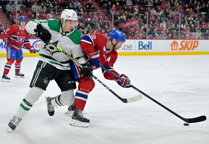 Feb 10, 2024; Montreal, Quebec, CAN; Montreal Canadiens defenseman Mike Matheson (8) controls the puck against Dallas Stars forward Jason Robertson (21) during the third period at the Bell Centre. Mandatory Credit: Eric Bolte-USA TODAY Sports