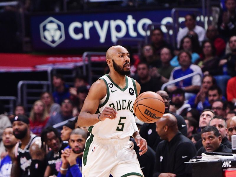 LOS ANGELES, CA - FEBRUARY 10: Jevon Carter #5 of the Milwaukee Bucks dribbles the ball during the game against the LA Clippers on February 10, 2023 at Crypto.Com Arena in Los Angeles, California. NOTE TO USER: User expressly acknowledges and agrees that, by downloading and/or using this Photograph, user is consenting to the terms and conditions of the Getty Images License Agreement. Mandatory Copyright Notice: Copyright 2023 NBAE (Photo by Adam Pantozzi/NBAE via Getty Images)