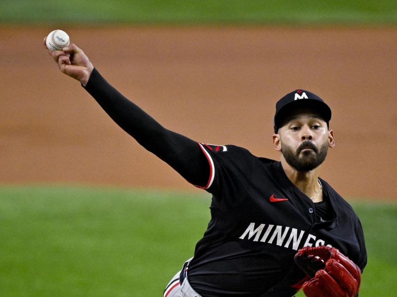 Aug 18, 2024; Arlington, Texas, USA; Minnesota Twins starting pitcher Pablo Lopez (49) pitches against the Texas Rangers during the first inning at Globe Life Field. Mandatory Credit: Jerome Miron-USA TODAY Sports
