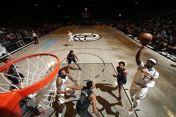 BROOKLYN, NY - DECEMBER 22: Reggie Jackson #7 of the Denver Nuggets goes to the basket during the game on December 22, 2023 at Barclays Center in Brooklyn, New York. NOTE TO USER: User expressly acknowledges and agrees that, by downloading and or using this Photograph, user is consenting to the terms and conditions of the Getty Images License Agreement. Mandatory Copyright Notice: Copyright 2023 NBAE (Photo by Nathaniel S. Butler/NBAE via Getty Images)