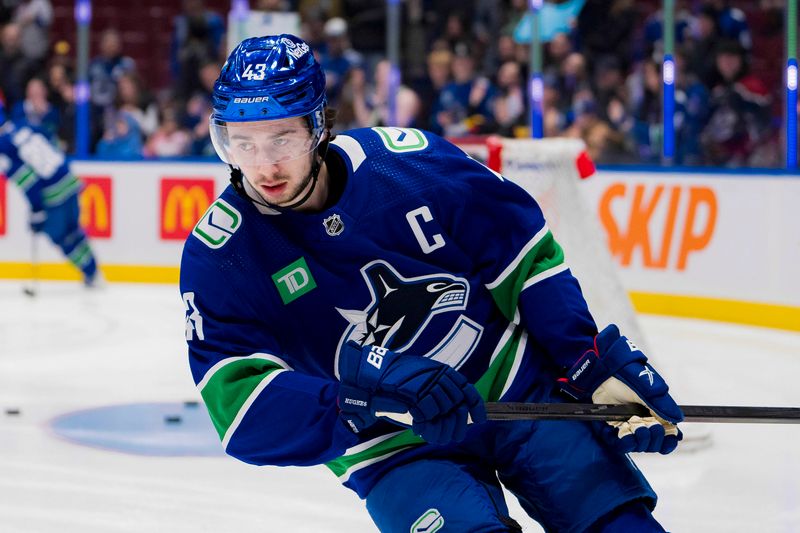 Jan 24, 2024; Vancouver, British Columbia, CAN; Vancouver Canucks defenseman Quinn Hughes (43) skates during warm up prior to a game against the St. Louis Blues at Rogers Arena. Mandatory Credit: Bob Frid-USA TODAY Sports