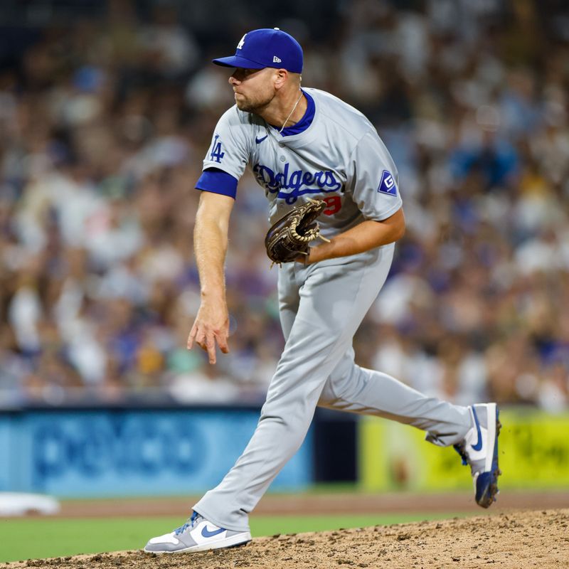 Jul 30, 2024; San Diego, California, USA; Los Angeles Dodgers relief pitcher Blake Treinen (49) throws a pitch during the ninth inning against the San Diego Padres at Petco Park. Mandatory Credit: David Frerker-USA TODAY Sports