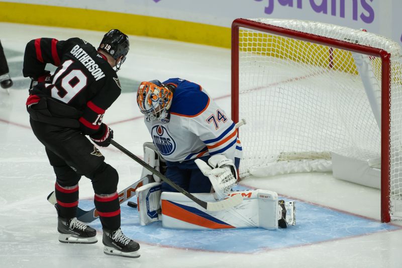 Nov 19, 2024; Ottawa, Ontario, CAN; Edmonton Oilers goalie Stuart Skinner (74) makes a save on a shot from  Ottawa Senators right wing Drake Batherson (19) in the third period at the Canadian Tire Centre. Mandatory Credit: Marc DesRosiers-Imagn Images