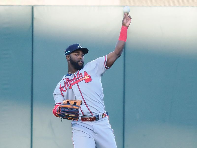 Aug 27, 2023; San Francisco, California, USA; Atlanta Braves center fielder Michael Harris II (23) throws the ball infield against the San Francisco Giants during the eighth inning at Oracle Park. Mandatory Credit: Kelley L Cox-USA TODAY Sports