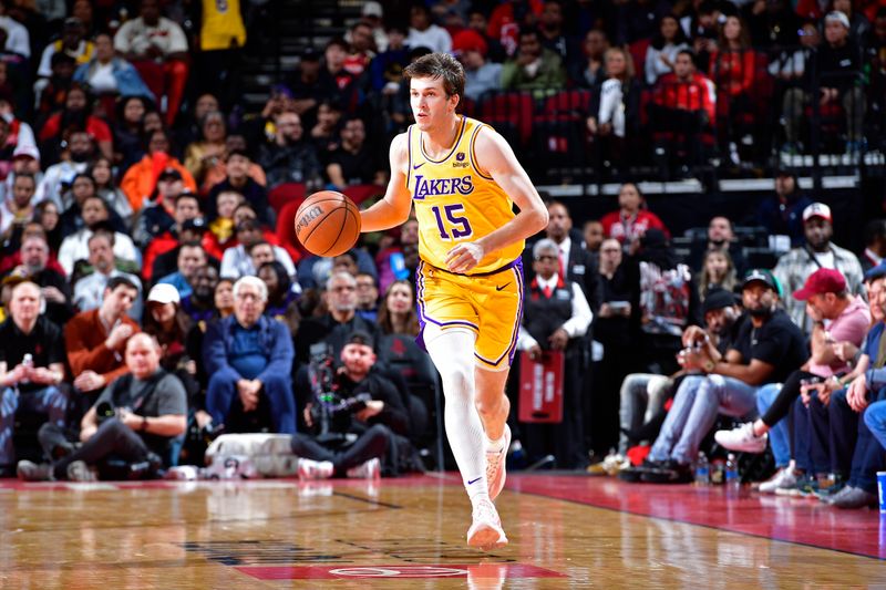 HOUSTON, TX - JANUARY 29:  Austin Reaves #15 of the Los Angeles Lakers dribbles the ball during the game against the Houston Rockets on January 29, 2024 at the Toyota Center in Houston, Texas. NOTE TO USER: User expressly acknowledges and agrees that, by downloading and or using this photograph, User is consenting to the terms and conditions of the Getty Images License Agreement. Mandatory Copyright Notice: Copyright 2024 NBAE (Photo by Logan Riely/NBAE via Getty Images)