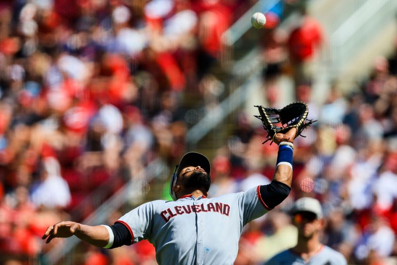 May 18, 2025; Cincinnati, Ohio, USA; Cleveland Guardians first baseman Carlos Santana (41) attempts to catch a pop up hit by Cincinnati Reds first baseman Connor Joe (not pictured) in the sixth inning at Great American Ball Park. Mandatory Credit: Katie Stratman-Imagn Images