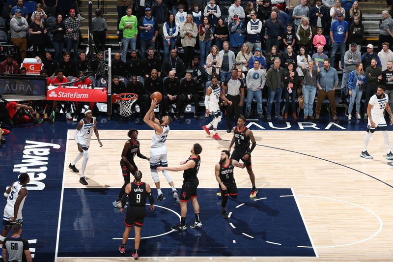 MINNEAPOLIS, MN -  FEBRUARY 4: Rudy Gobert #27 of the Minnesota Timberwolves drives to the basket during the game against the Houston Rockets on February 4, 2024 at Target Center in Minneapolis, Minnesota. NOTE TO USER: User expressly acknowledges and agrees that, by downloading and or using this Photograph, user is consenting to the terms and conditions of the Getty Images License Agreement. Mandatory Copyright Notice: Copyright 2024 NBAE (Photo by David Sherman/NBAE via Getty Images)