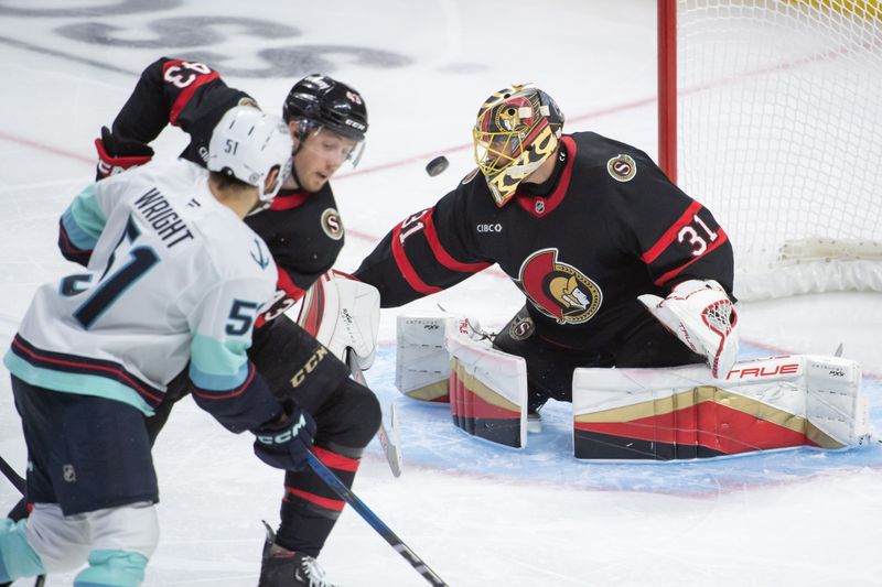 Nov 2, 2024; Ottawa, Ontario, CAN; Ottawa Senators  goalie Anton Forsberg (31) makes a save in front of Seattle Kraken center Shane Wright (51) in the third period at the Canadian Tire Centre. Mandatory Credit: Marc DesRosiers-Imagn Images