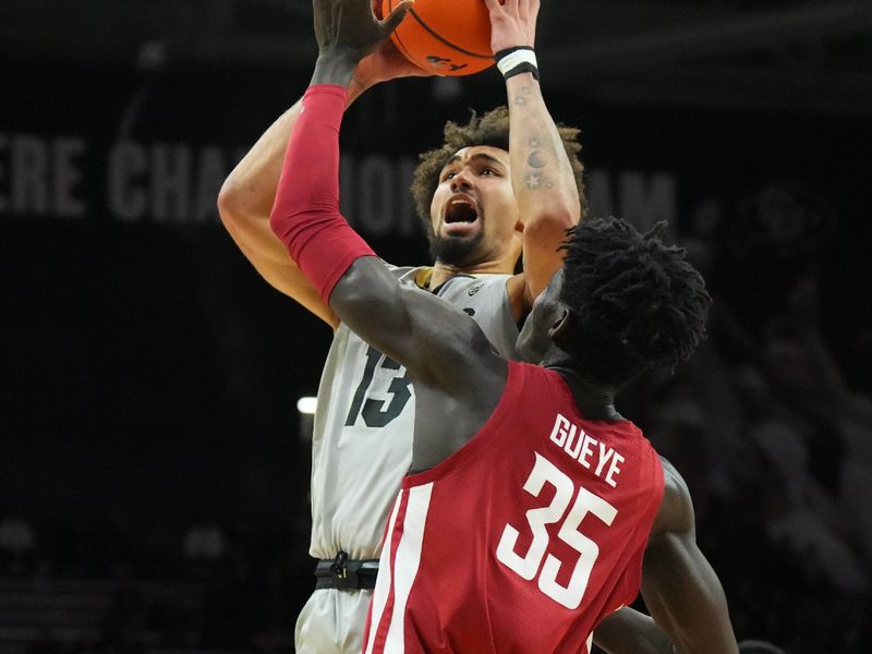 Jan 22, 2023; Boulder, Colorado, USA; Colorado Buffaloes guard J'Vonne Hadley (13) shoots over Washington State Cougars forward Mouhamed Gueye (35) in the first half at the CU Events Center. Mandatory Credit: Ron Chenoy-USA TODAY Sports