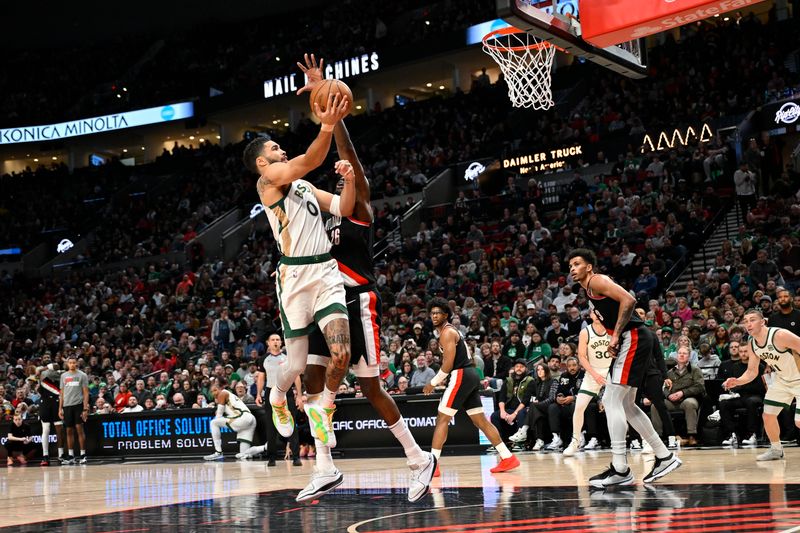 PORTLAND, OREGON - MARCH 11: Jayson Tatum #0 of the Boston Celtics shoots against Duop Reath #26 of the Portland Trail Blazers during the second quarter at the Moda Center on March 11, 2024 in Portland, Oregon. NOTE TO USER: User expressly acknowledges and agrees that, by downloading and or using this photograph, User is consenting to the terms and conditions of the Getty Images License Agreement. (Photo by Alika Jenner/Getty Images)