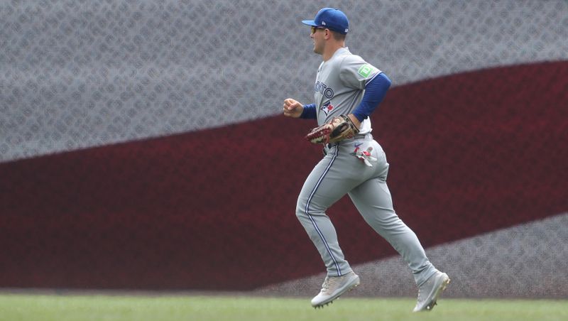 Aug 20, 2025; Pittsburgh, Pennsylvania, USA;  Toronto Blue Jays center fielder Daulton Varsho (5) takes his position n the field against the Pittsburgh Pirates for the bottom of the third inning at PNC Park. Mandatory Credit: Charles LeClaire-Imagn Images